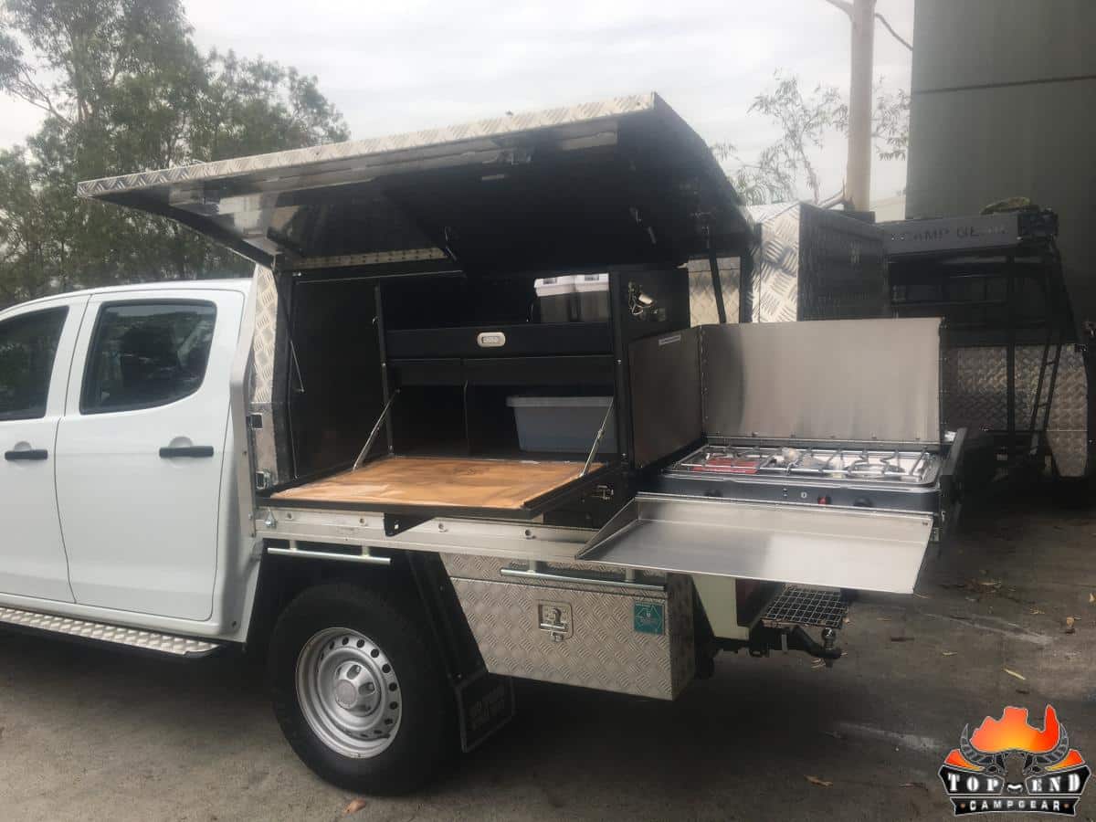 Longhaul Camp Kitchen with Low Mount Slide installed in a ute canopy for convenient slide-out cooking access.