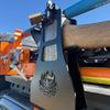 Close-up of the Top End Campgear Axe, Jack & Shovel Rack bracket with padlock - heavy-duty, lockable 4WD recovery mount