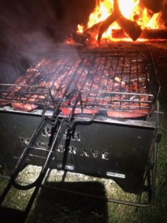 Bush Microwave with chops cooking in the Grill Basket